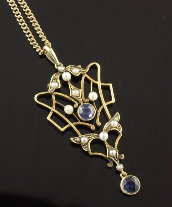 An Edwardian Art Nouveau gold, sapphire and split and seed pearl set pendant necklace, 1.5in.